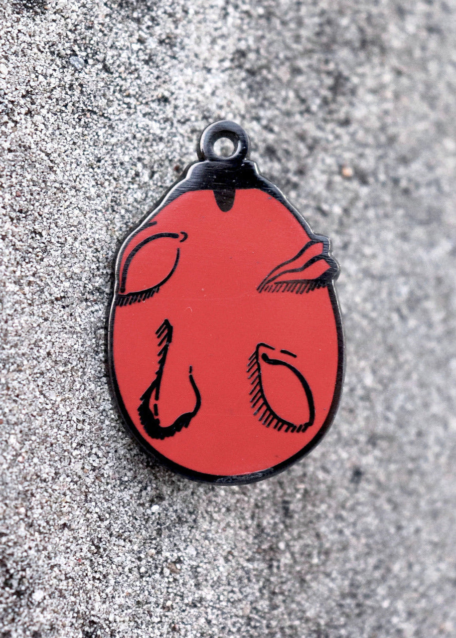 Behelit Enamel Pin