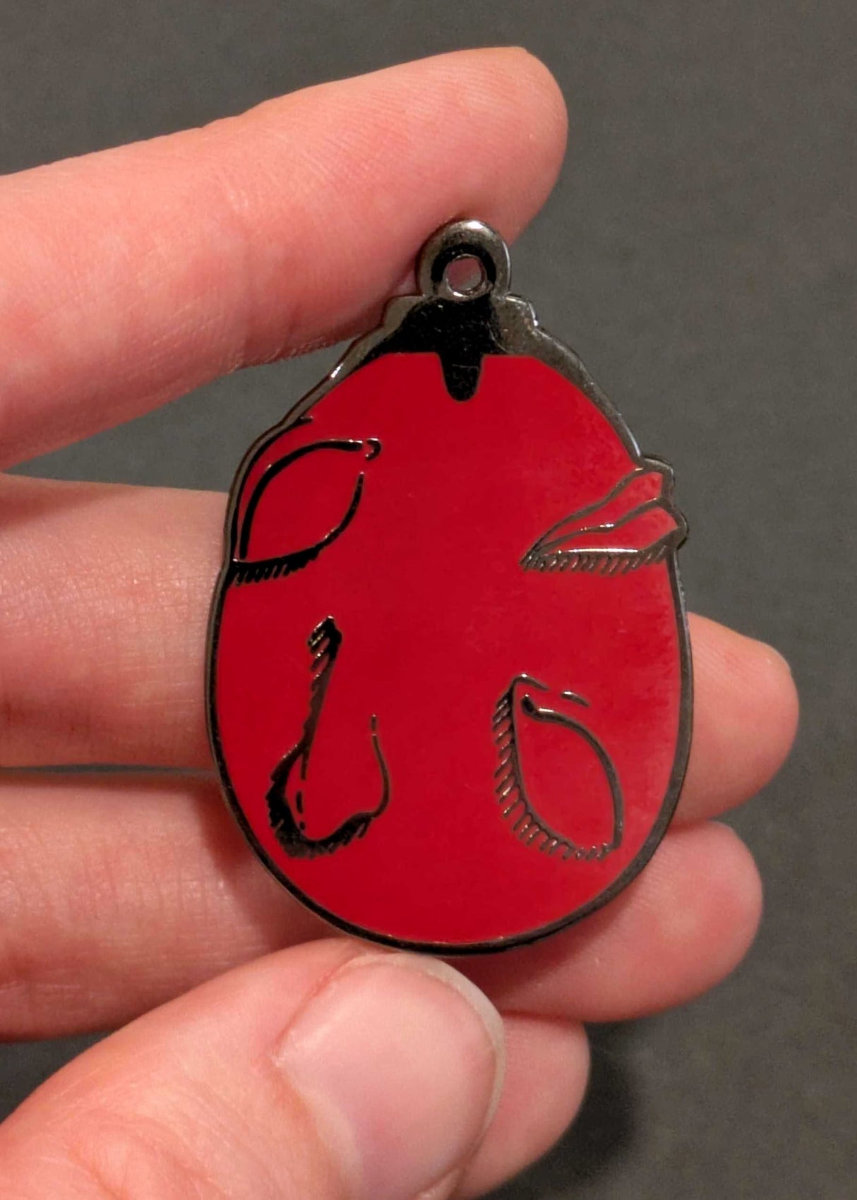 Behelit Enamel Pin