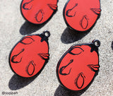 Behelit Enamel Pin